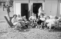 A Day At The Beach By The Beach Huts 1940s