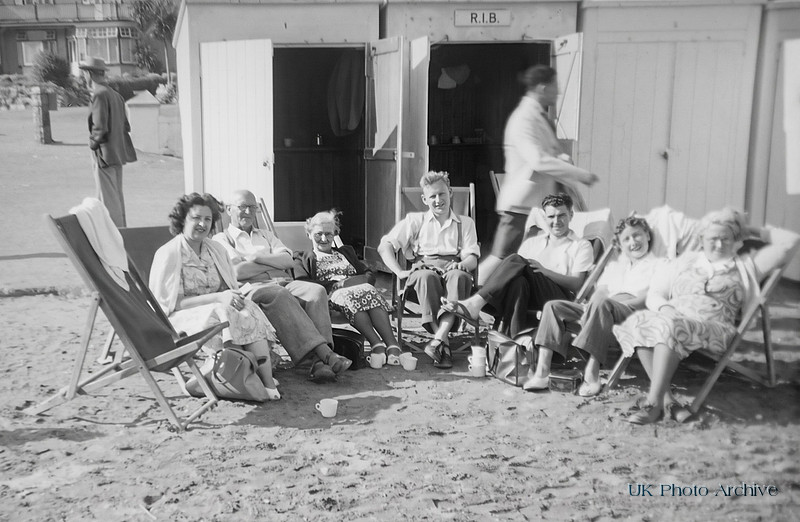 A Day At The Beach By The Beach Huts 1940s