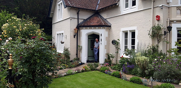 Ken Rogers Standing In The Doorway Of West Lodge Ashtead Park