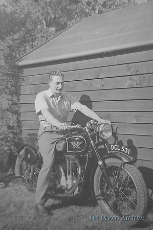 A Man On A Motorbike In The 1950s