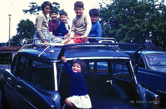 Children Playing On A Car 1964