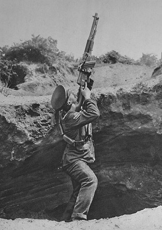 A British Cavalryman Using A Hotchkiss Gun Sighting A German Aeroplane