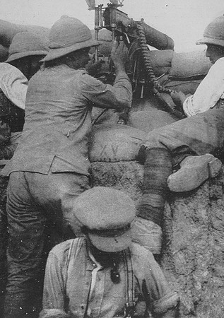 A British Machine Gunner At Work In The Trenches In Gallipoli