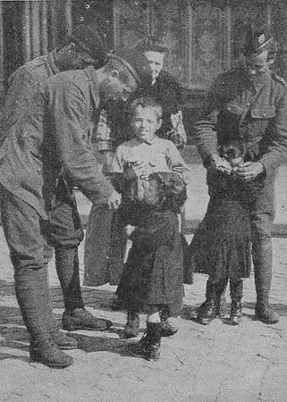 British Soldiers Meeting Children In A French Village