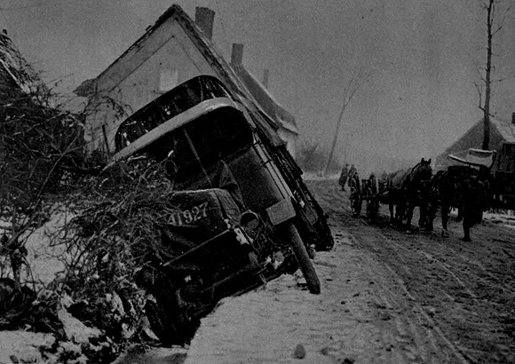 A Big Transport Lorry Which Has Run Off The Road Into A Ditch Which Had Been Concealed By A Thick Layer Of Snow