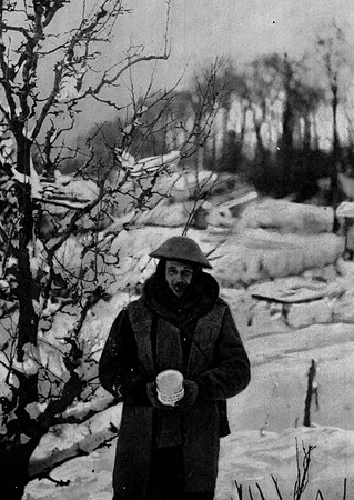 A British Solider On The Western Front With A Christmas Pudding From Home