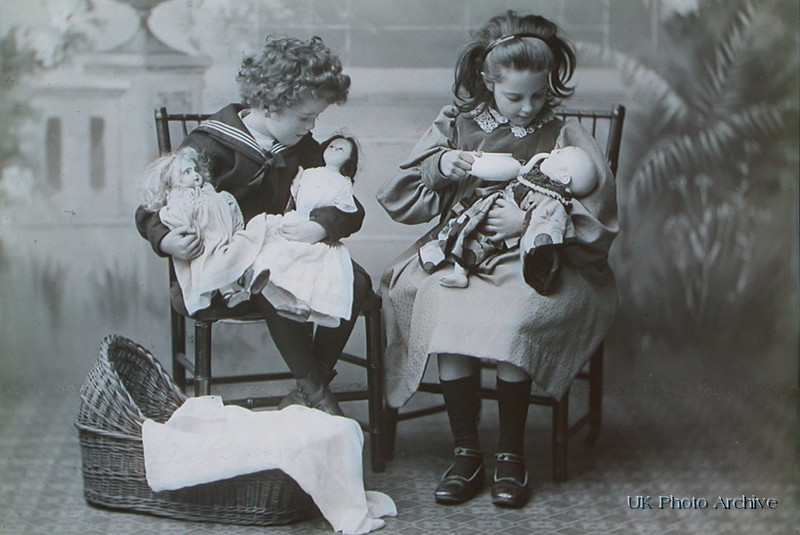 Victorian Children Playing With Their Toys
