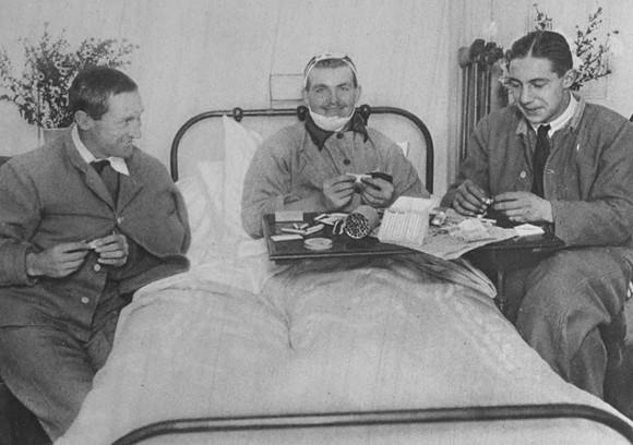 Wounded Soldiers Making Cigarettes For Comrades