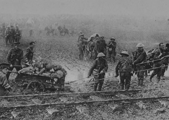 Dragging A Lewis Machine Gun Through The Mud On The Western Front