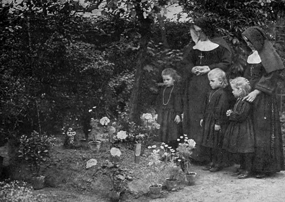 Village Children TendingThe Grave Of Major Wiliam Redmond Who Was Mortally Wounded At Messines Ridge And BuriesIn The Convent At Loecre