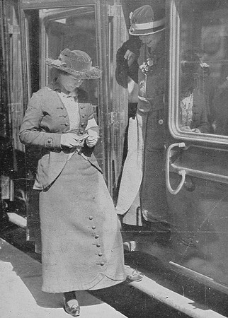 A Woman Ticket Collector At Paddington Station