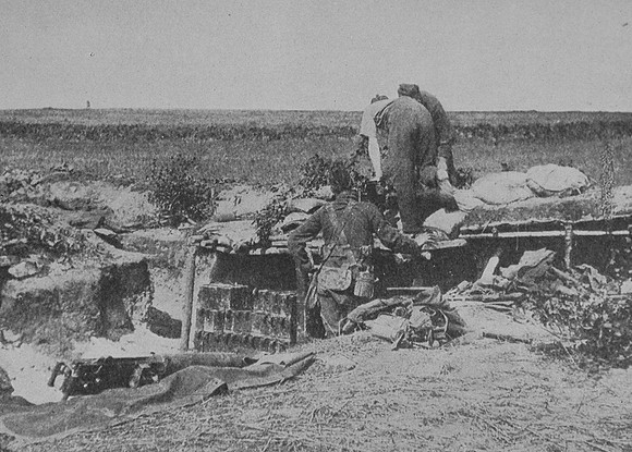 British Soldiers Fixing A Machine Gun In Position