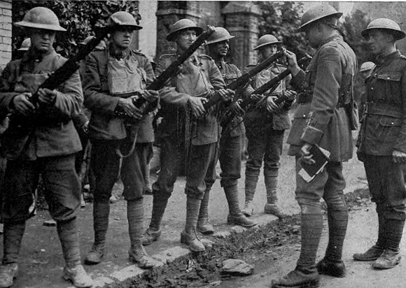 A Canadian Officer Inspecting Mens Rifles
