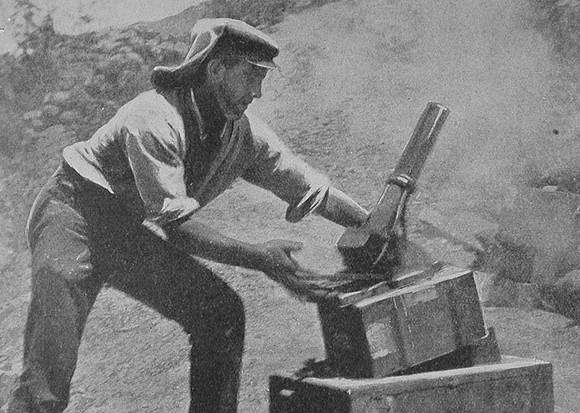 An Australian Firing A Trench Mortar
