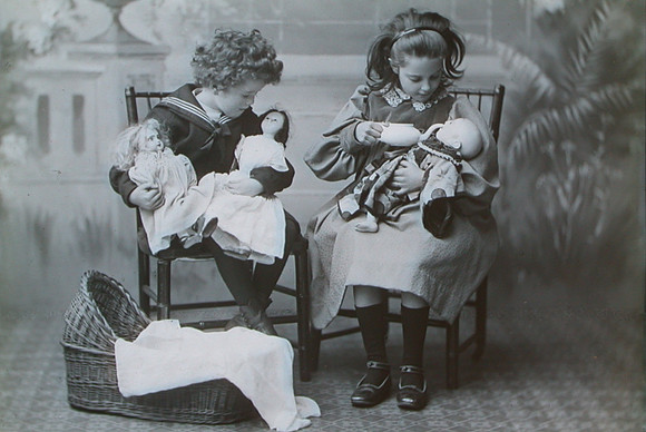 Victorian Children Playing With Their Dolls