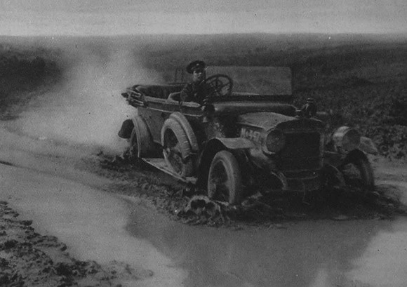 A Car Churning Its Way Through The Mud And Water On The Western Front Early In 1917