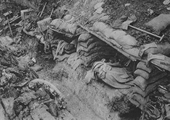 A Tired British Soldier Taking A Rest In A Trench On The Western Front