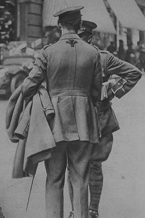 An Officer Wearing A Back Badge To Allow Men Following To Know Their Officers