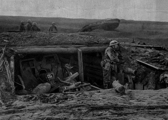 A German Gun Pit Captured By The Tank In The Background