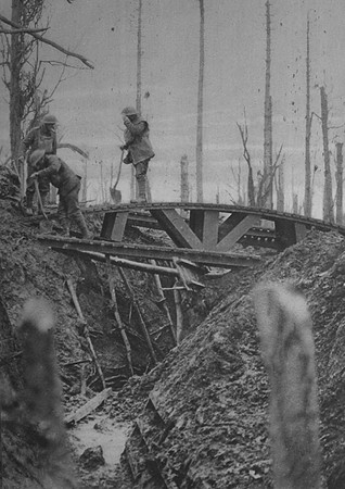 A British Infantry Working Party Bridging A Captured German Trench