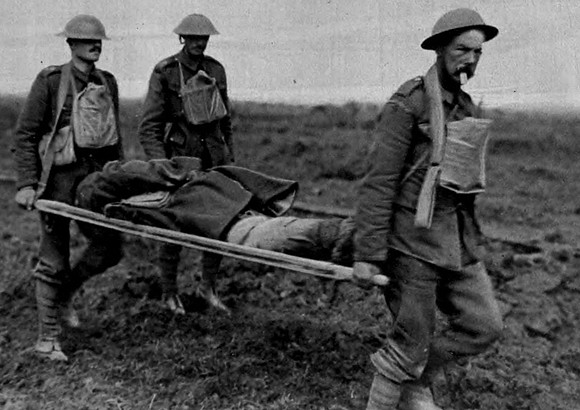 Guardsmen Acting As Stretcher Bearers On A Flanders Battlefield