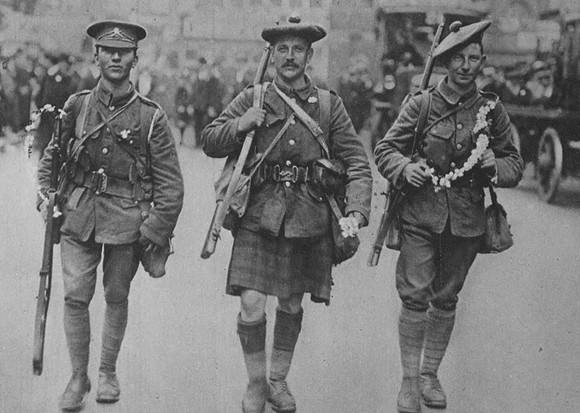 Three Soldiers At Victoria Station Wearing Alexandra Day Roses