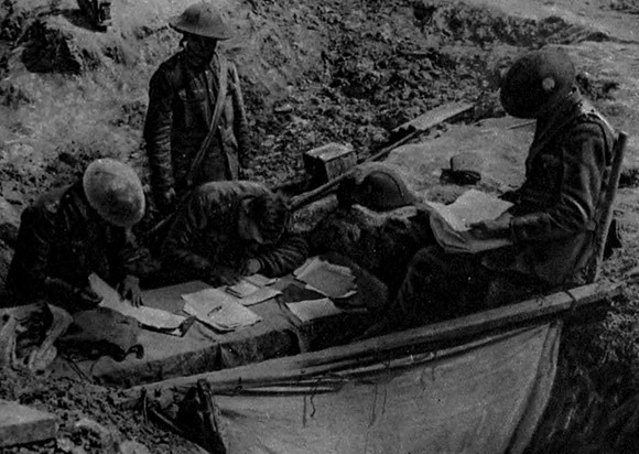 A Battalion Orderly Room Attending To Daily Correspondence In A Shell Crater