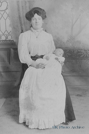 A Victorian Mother With Baby