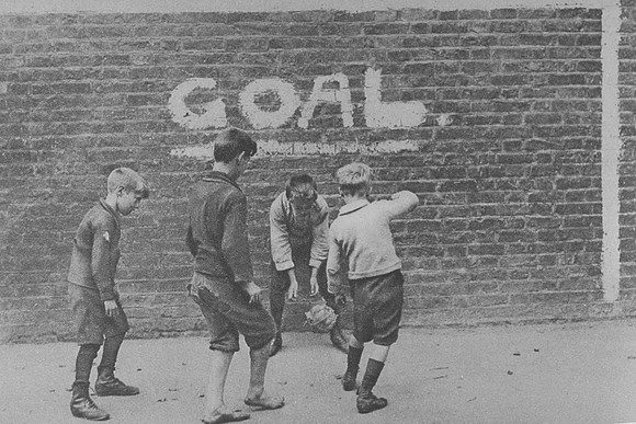 Boys Playing Football In The East End 1920s