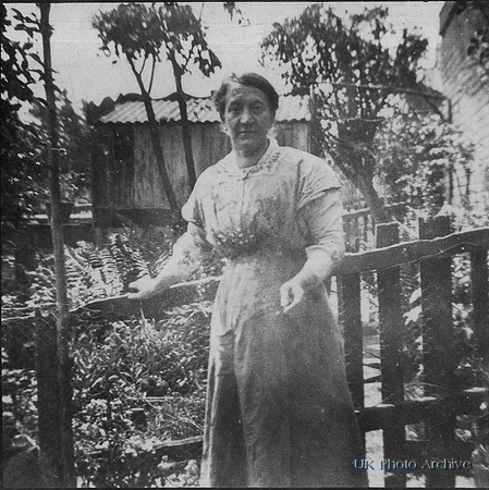 A Woman In Her Garden