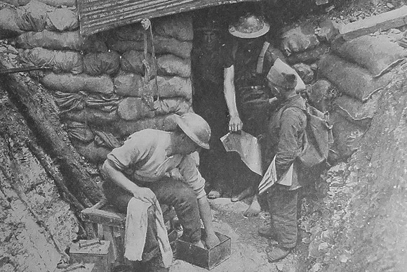A French Boy Selling English Newspapers In The Trenches