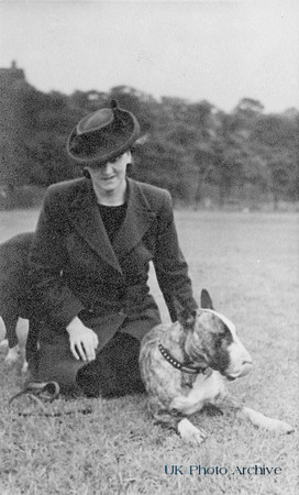 A Woman With An English Bull Terrier 1940s