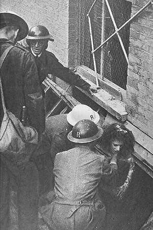 After The Daylight Raid On Central London October 1940 A Survivor Is Lifted From A Basement