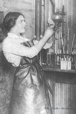 A Scottish Dairy Woman Testing Milk In A Laboratory