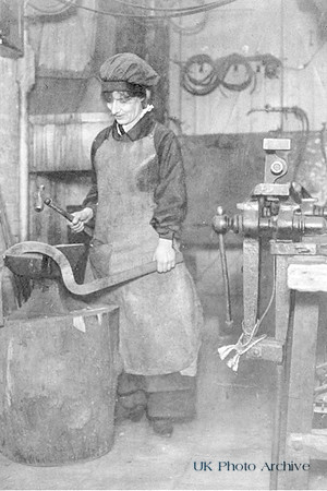 A Woman Worker In The Blacksmiths Shop  In The War Hospital Supply Depot In Kensington