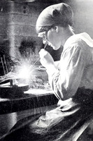 A Woman Acetyline Welding In Aeroplane Works