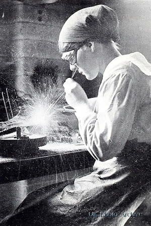 A Woman Acetyline Welding In Aeroplane Works