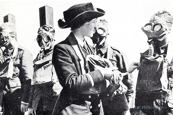 A WRNS Officer Giving Gas Mask Instruction