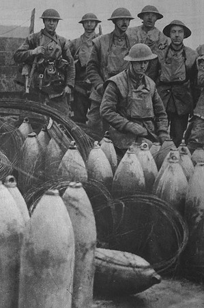 A Group Of Men And Munitions