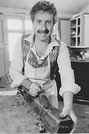 A Man Working With Woodworking Equipment 1970s