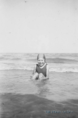 Little Girl In The Sea Wearing A Bathing Hat 1930s