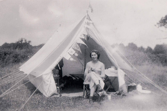 Woman Camping In A Tent With Bunting 1930s