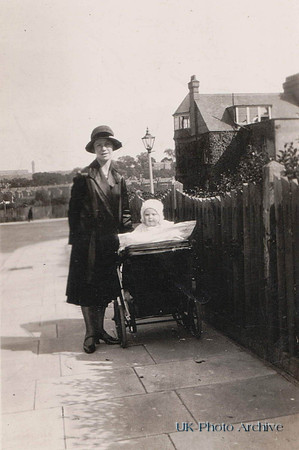 Woman With Baby In Pram 1920s