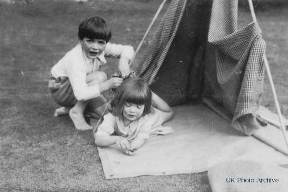 Two Children Brother And Sister Playing Tents 1950s