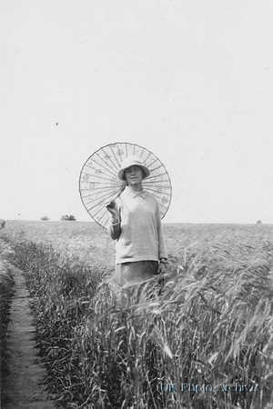 Women With A Parasol Walking In A Field 1920s