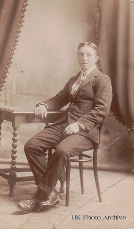 A Smartly Dressed Young Man Wearing A Suit C.1910