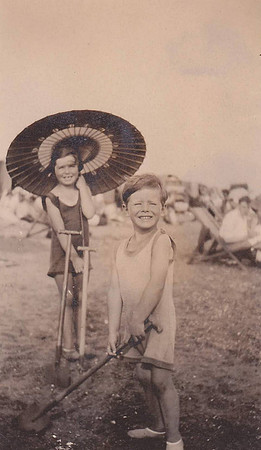 Children On The Beach With Spades And A Parasol 1920s