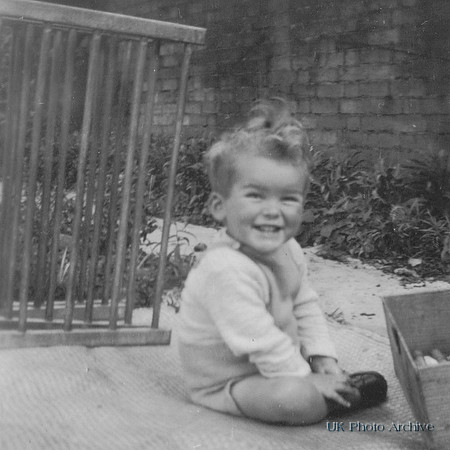 A Cute Baby In The Garden 1930s