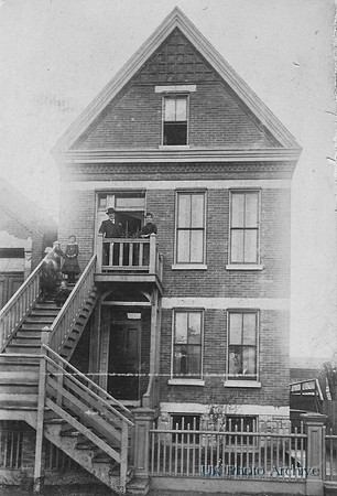 Family Outside Their House