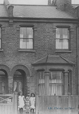 Outside A House In The 1910s